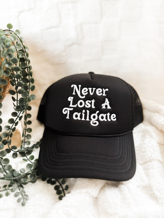 Black ‘Never Lost A Tailgate’ Trucker Hat