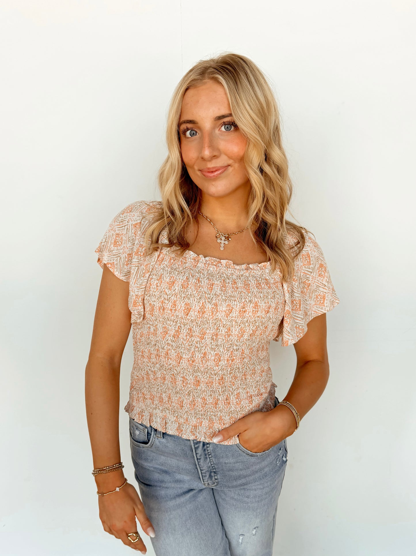 Light Coral Smocked Top